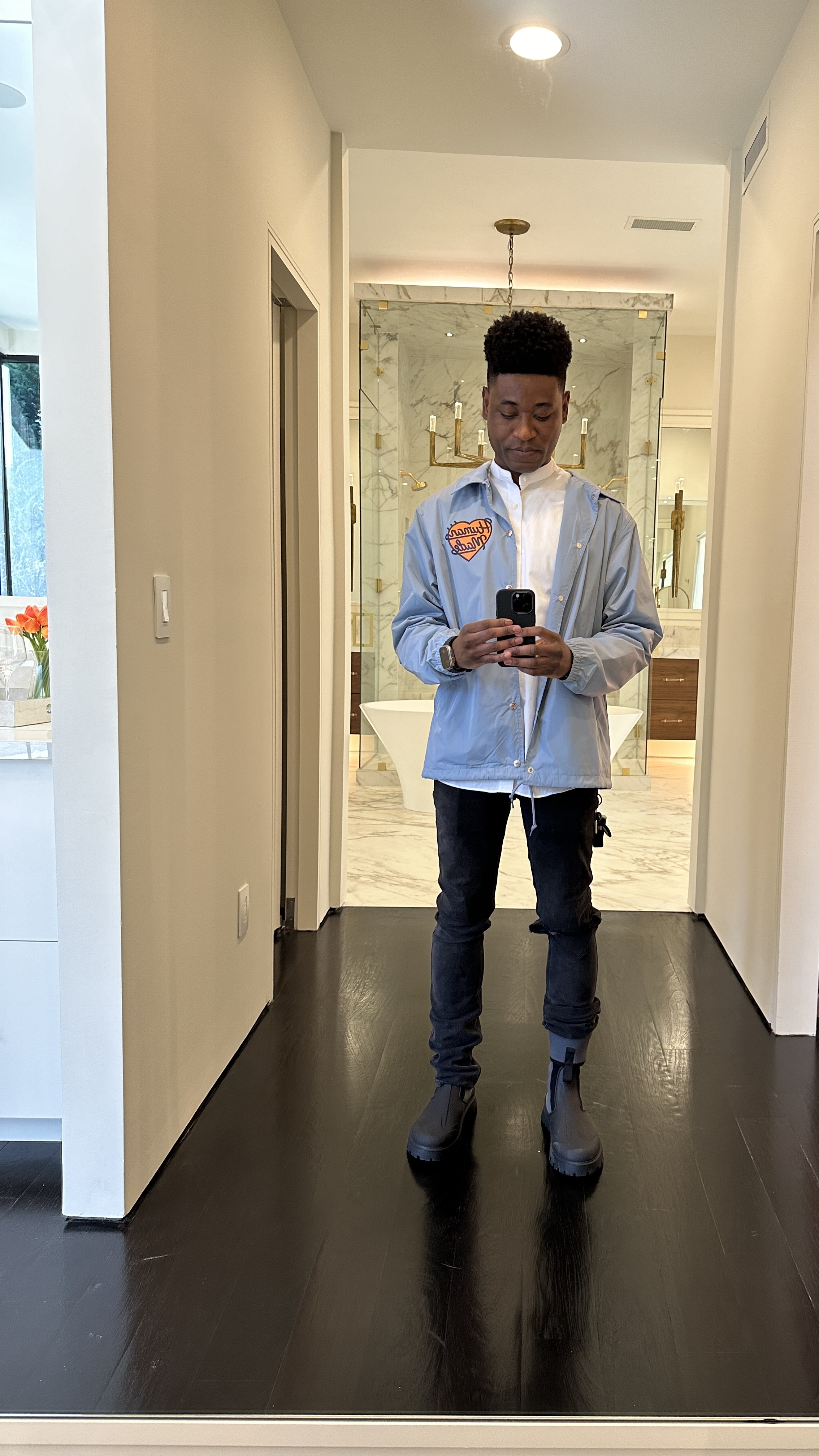 Nathan Fwamba Wearing Human Made Jacket, Acne Studio Jeans, and Dior Boots